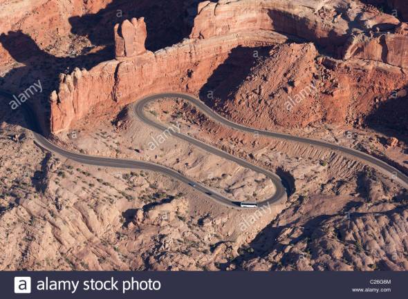 arches-national-park-aerial-view-winding-access-road-on-a-navajo-sandstone-C26G6M